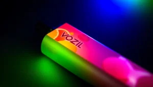 Vozol puff disposable vape in hand with vivid flavor branding, highlighting high puff capacity and stylish appearance for an engaging experience.